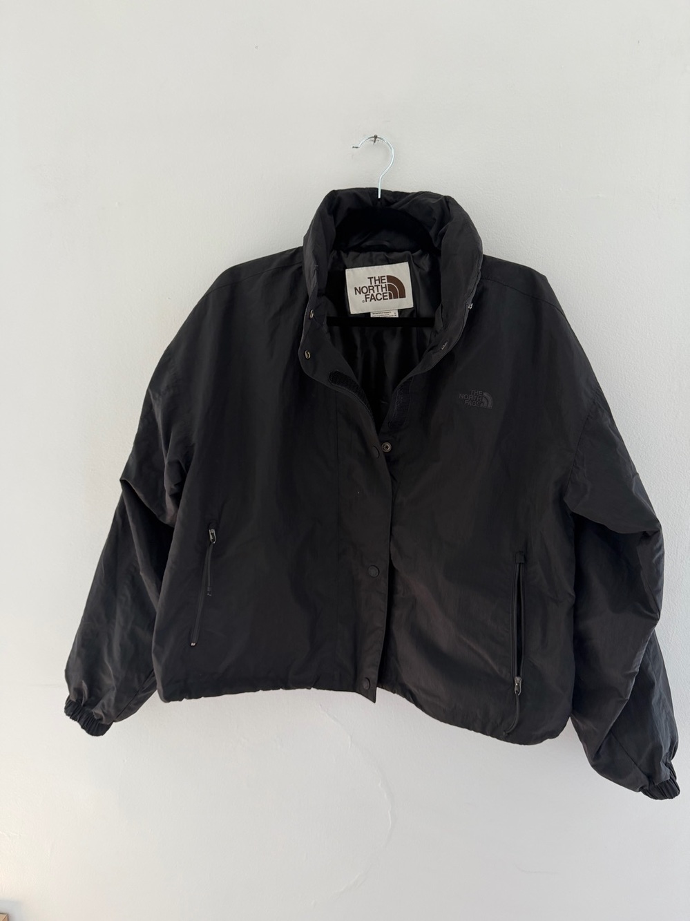 The North Face Small Women's Black Insulated Jacket with hidden hood